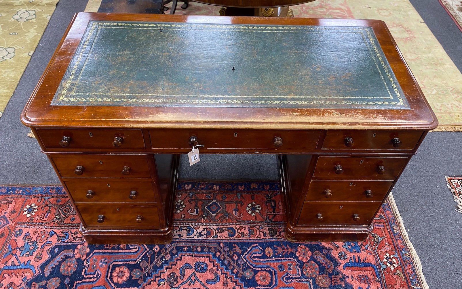 A Victorian mahogany pedestal desk, length 121cm, width 59cm, height 75cm